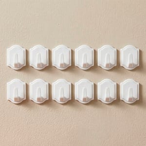 COLGADOR PLASTICO AUTOADHESIVO 12 UNIDADES LH-1216